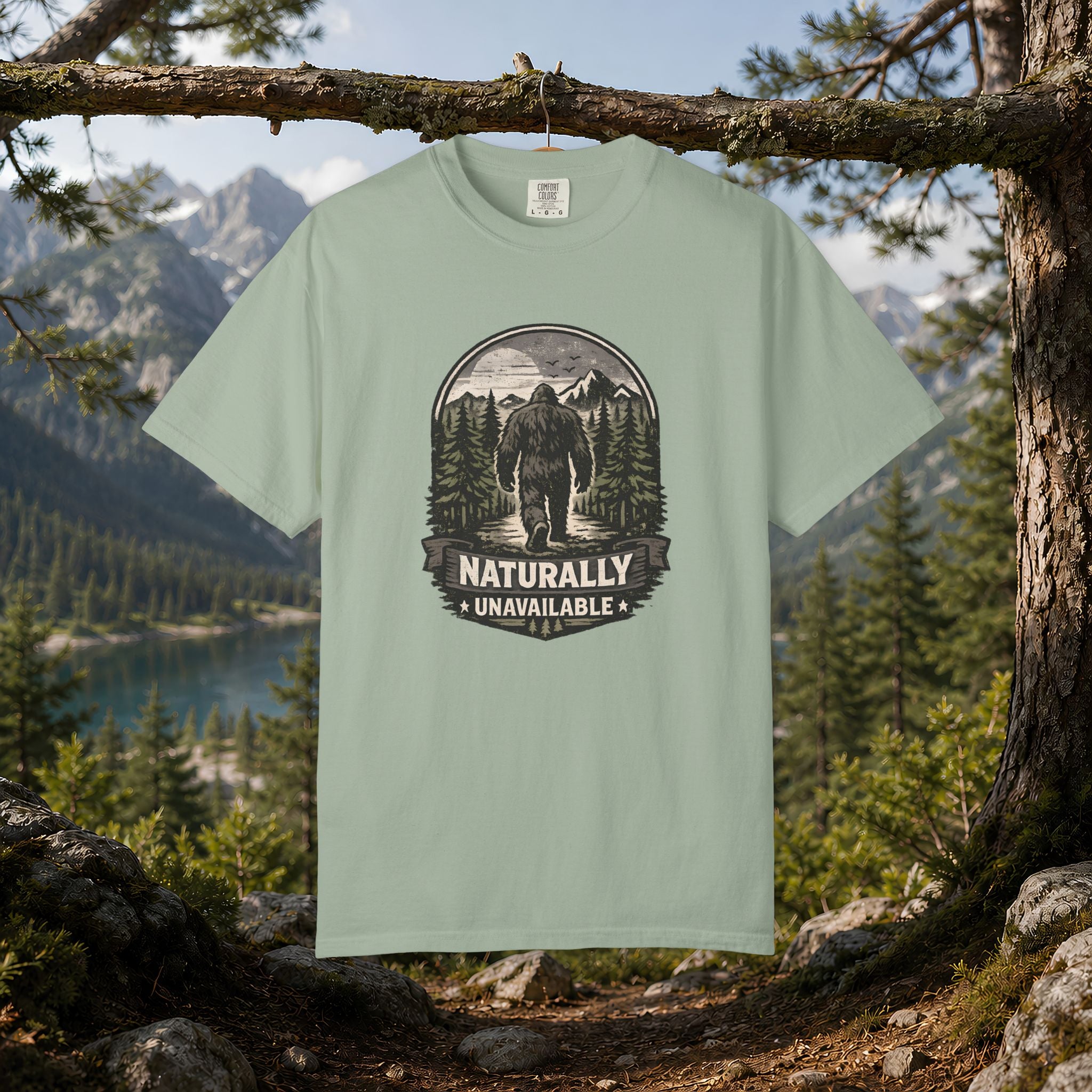 Bigfoot 'Naturally Unavailable' T-Shirt — Bigfoot Walking Into Forest Graphic
