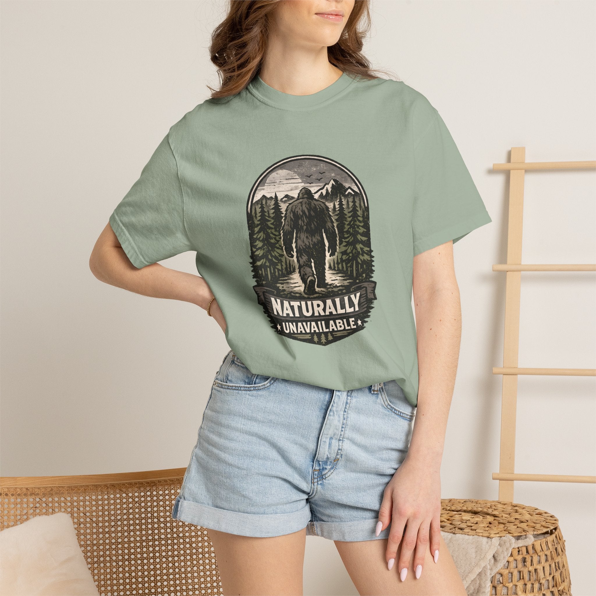 Bigfoot 'Naturally Unavailable' T-Shirt — Bigfoot Walking Into Forest Graphic