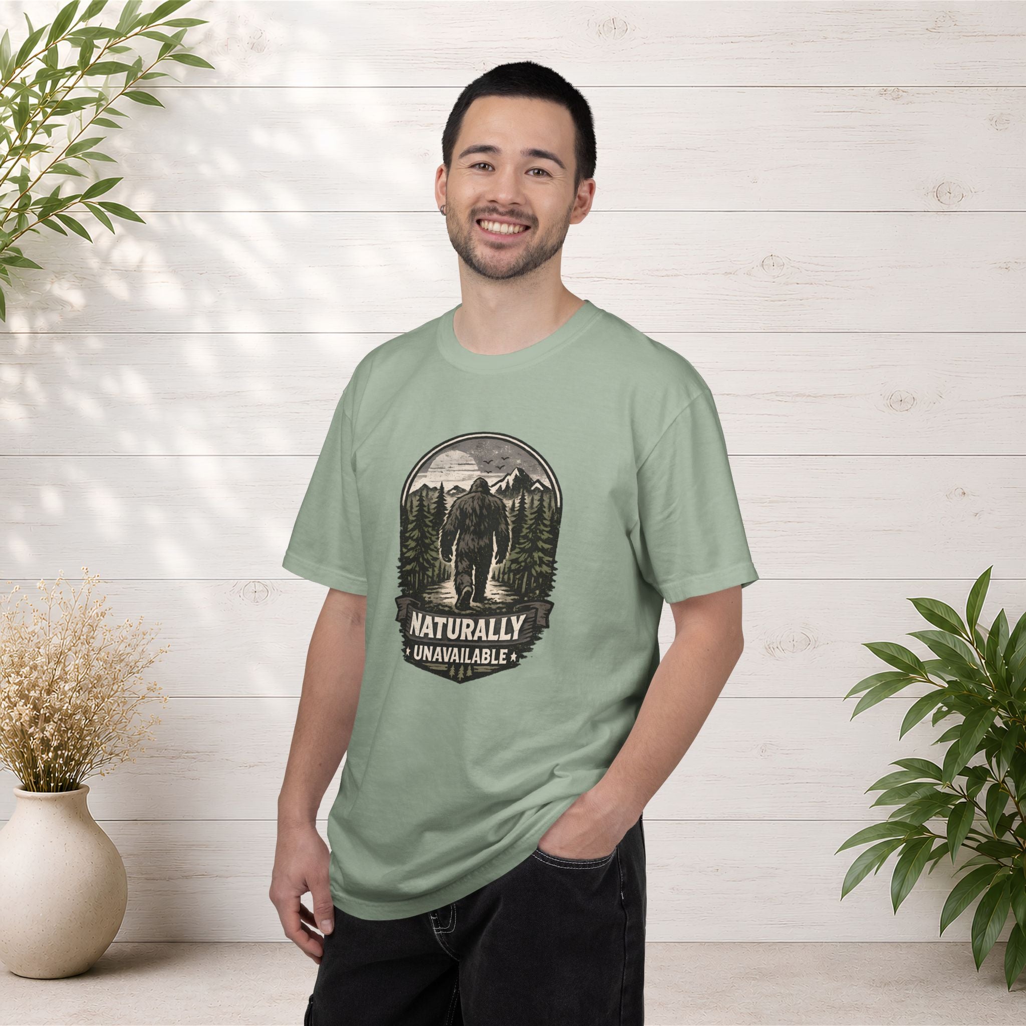 Bigfoot 'Naturally Unavailable' T-Shirt — Bigfoot Walking Into Forest Graphic
